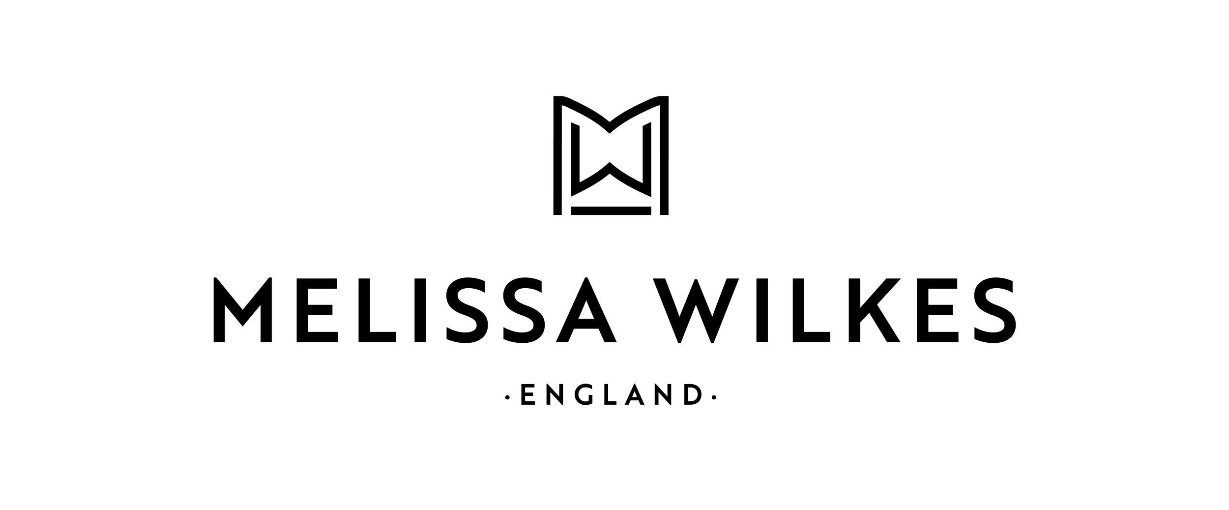 Black and white company logo for Melissa Wilkes.